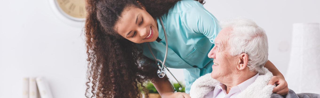 Panorama,Of,A,Happy,Nurse,With,A,Stethoscope,Covering,An